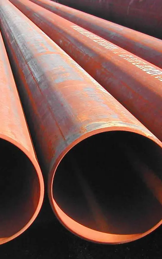 A close up of some pipes that are in the ground