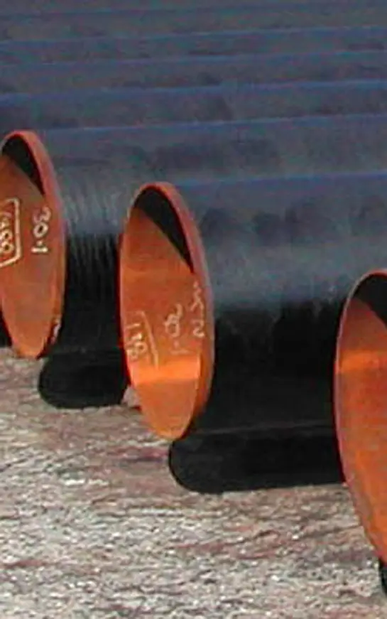A close up of some pipes with rust on them