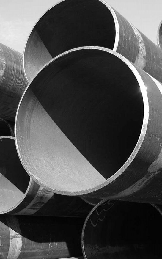 A close up of some pipes in black and white