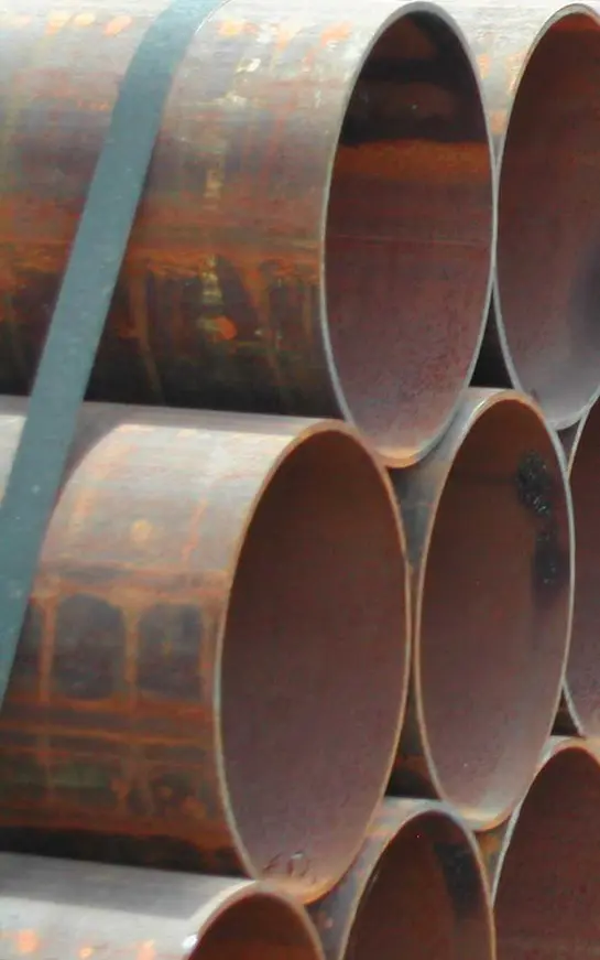 A close up of pipes stacked on top of each other