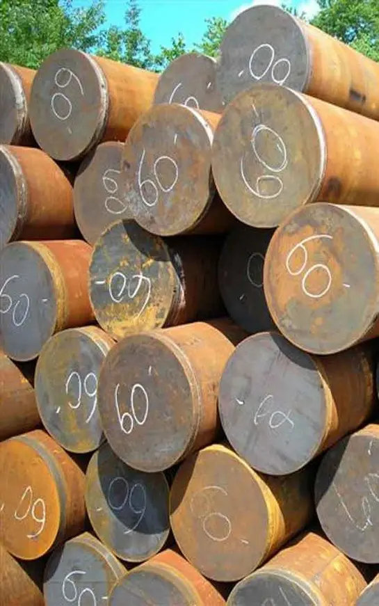 A pile of steel rods with numbers on them.